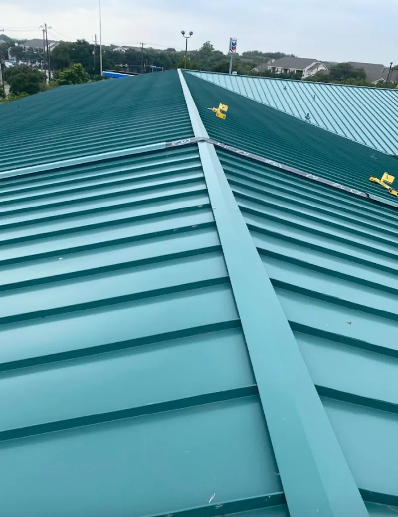 Green commercial metal roof ridge and valley for Metal Roof Repair in Wappingers Falls